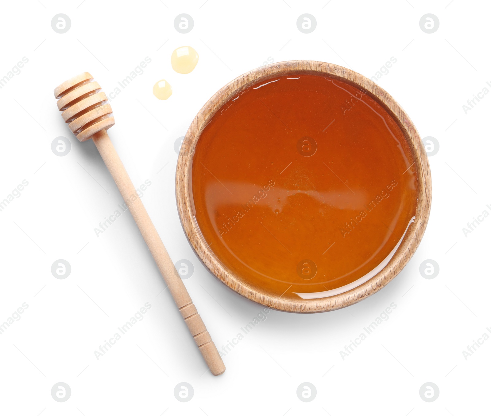 Photo of Tasty honey in bowl and dipper on white background, top view. Space for text