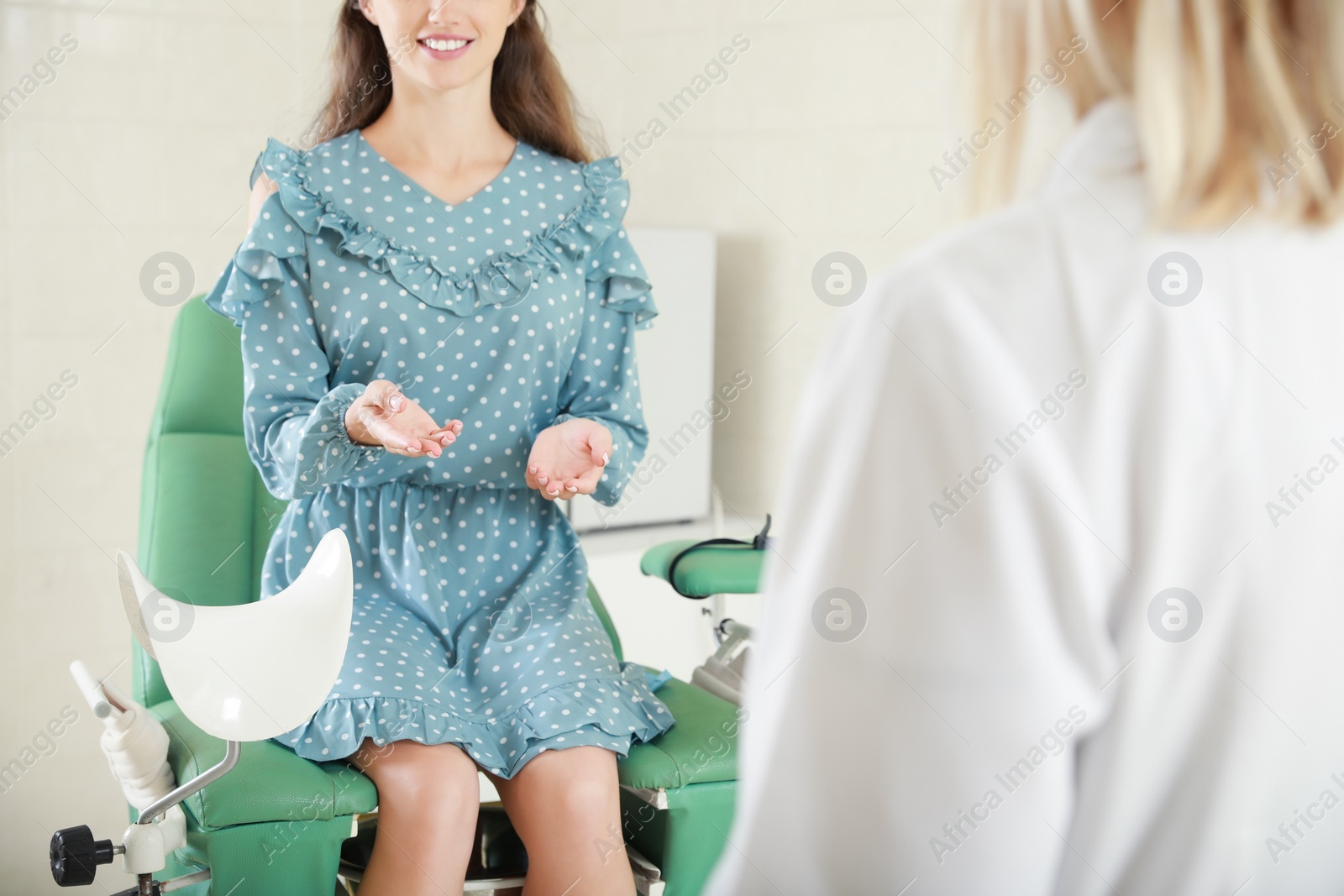 Photo of Woman having appointment with gynecologist in clinic, closeup. Patient consultation