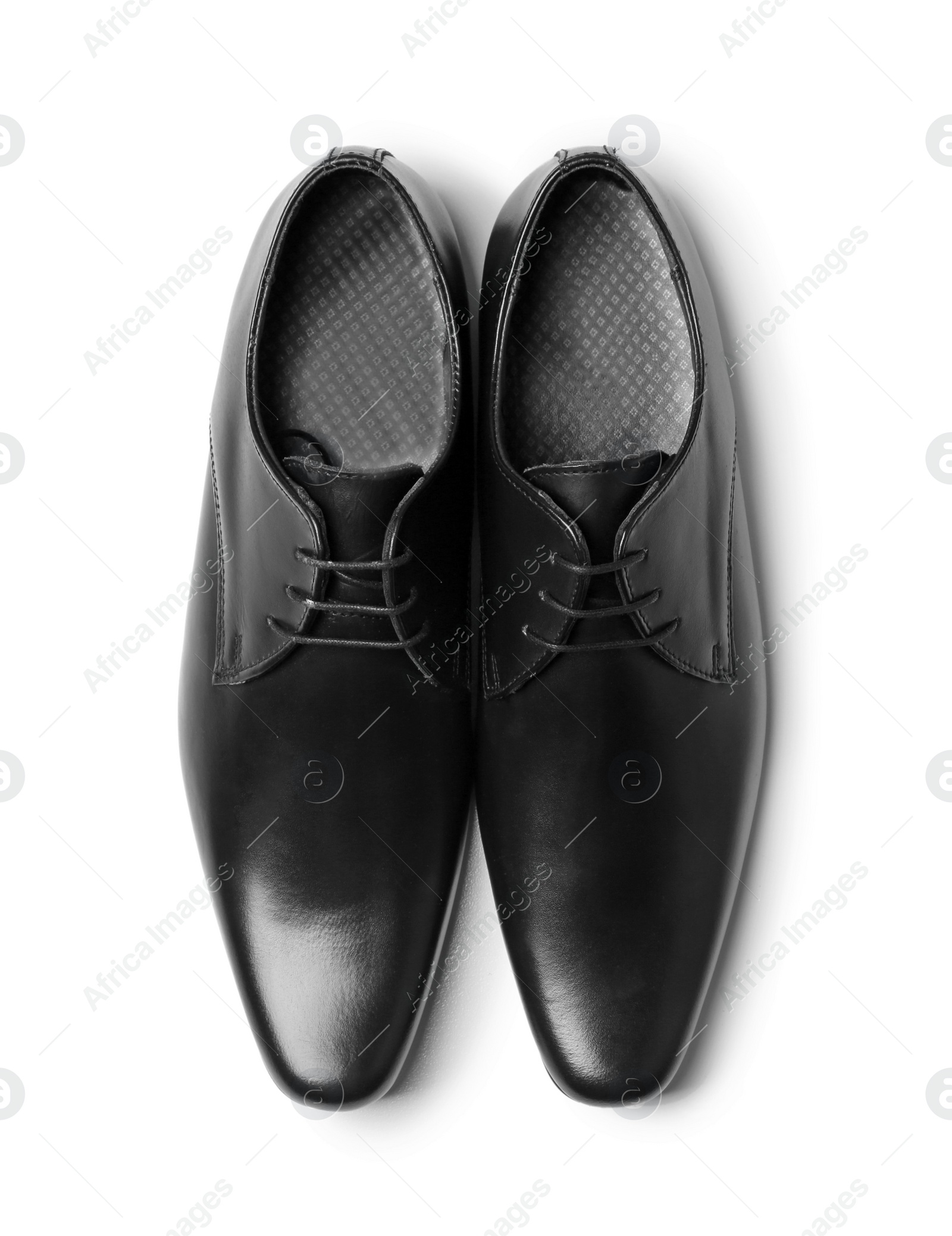 Photo of Elegant male shoes on white background