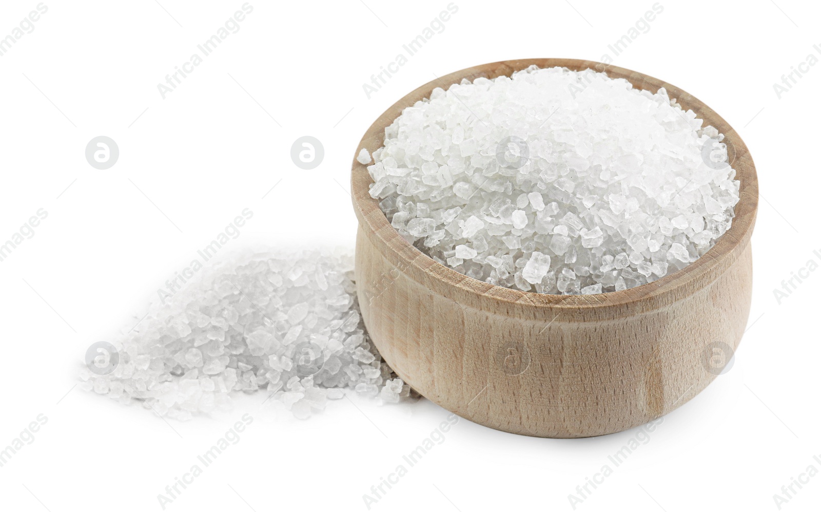 Photo of Natural salt in wooden bowl isolated on white