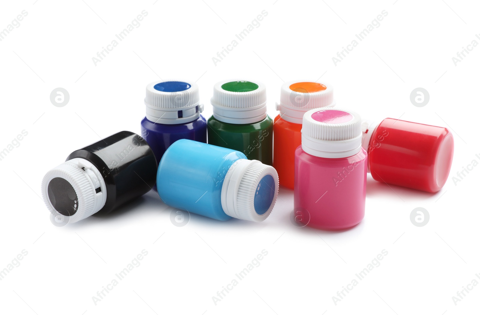 Photo of Jars with colorful paints on white background. Artistic equipment for children