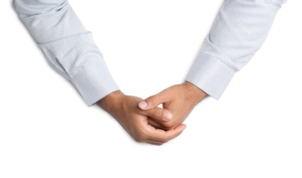 Photo of Man on white background, top view. Closeup of hands