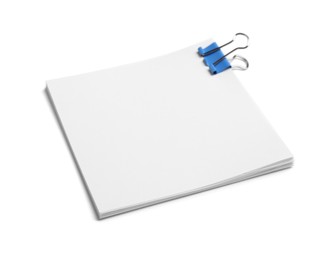 Photo of Note paper sheets with blue clip isolated white