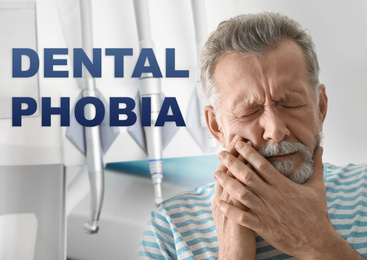Dental phobia concept. Mature man suffering from toothache