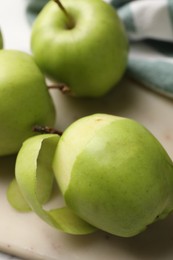 Ripe green apples on table, closeup view