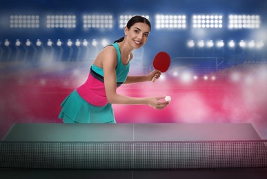 Image of Beautiful young woman playing ping pong at stadium