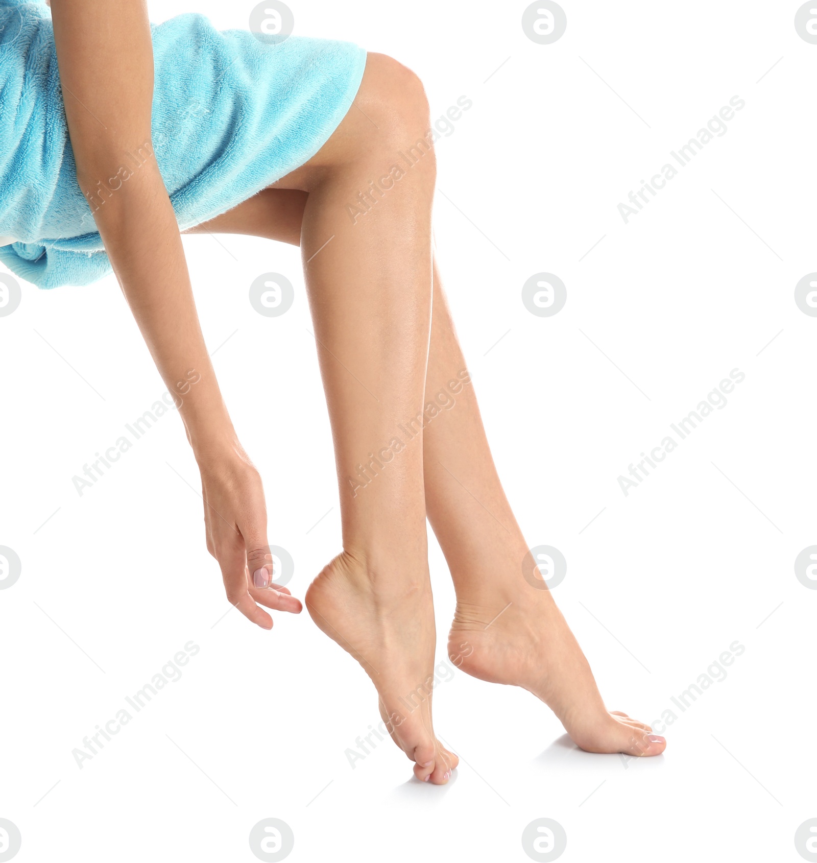 Photo of Woman with beautiful legs and feet on white background, closeup. Spa treatment