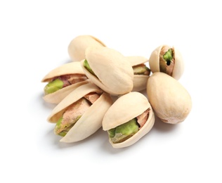 Tasty organic pistachio nuts on white background, closeup