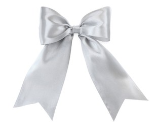 Photo of Beautiful silver ribbon tied in bow isolated on white, top view