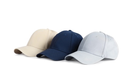 Photo of Baseball caps on white background. Mock up for design