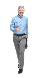 Mature businessman in stylish clothes with briefcase walking on white background