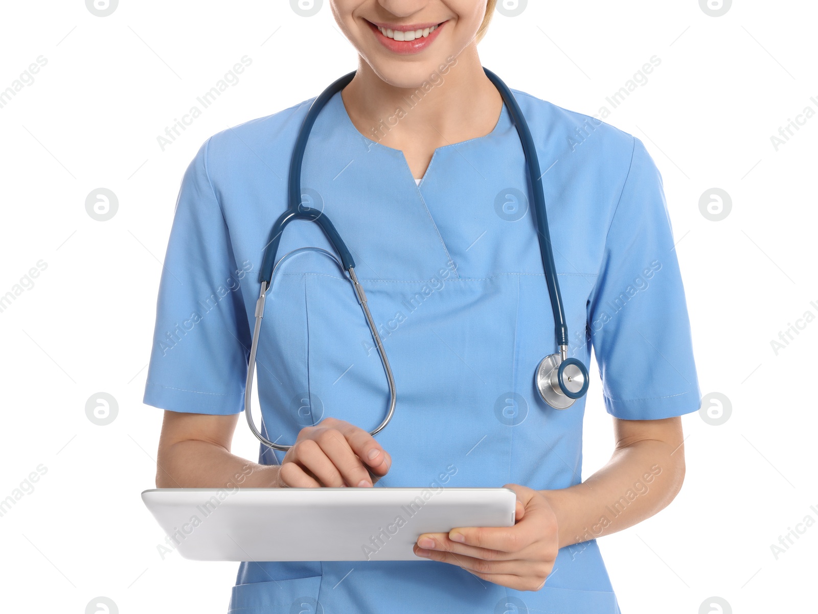 Photo of Medical doctor with stethoscope using tablet isolated on white, closeup