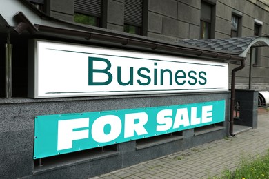 Image of Building with banner Business For Sale outdoors