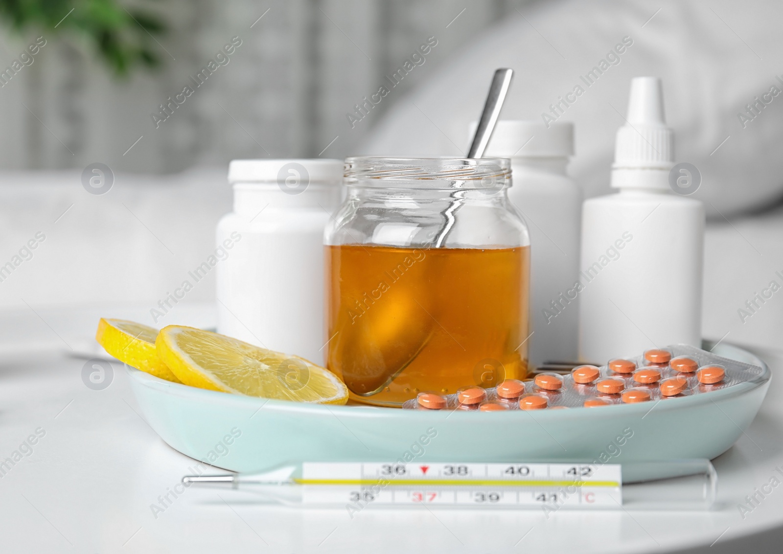 Photo of Set of different cold remedies on white table
