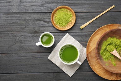 Flat lay composition with matcha tea on wooden background