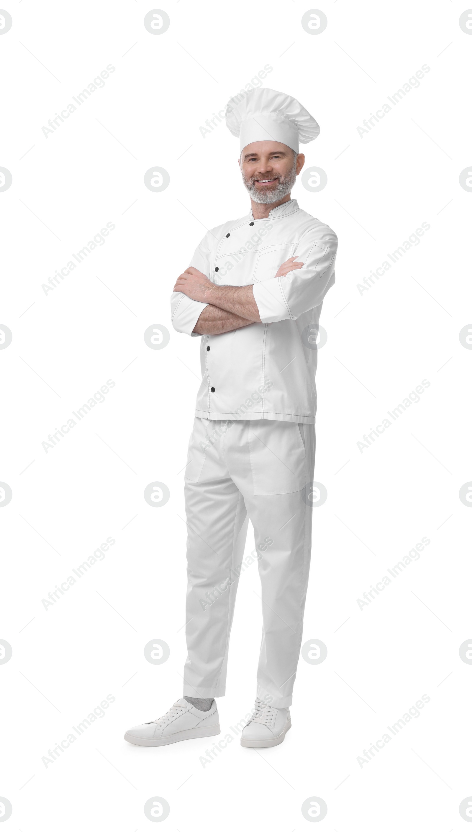 Photo of Happy chef in uniform with crossed arms on white background