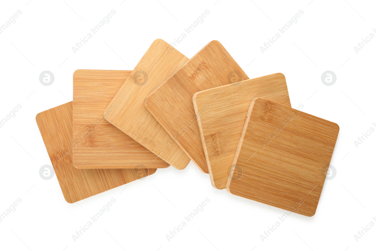 Photo of Wooden cup coasters on white background, top view