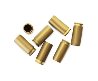 Photo of Shells of bullets on white background, top view