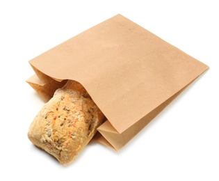 Paper bag with bread on white background. Space for design