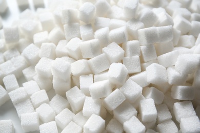 Photo of Refined sugar cubes as background
