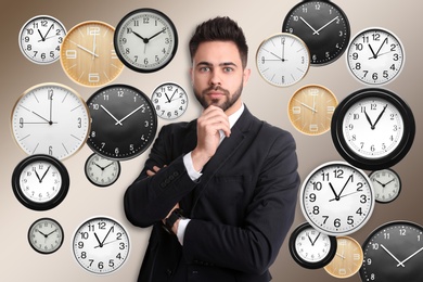Image of Time management concept. Thoughtful businessman surrounded by different clocks on color background