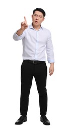 Photo of Angry businessman in formal clothes posing on white background