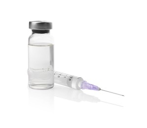 Photo of Disposable syringe with needle and vial isolated on white