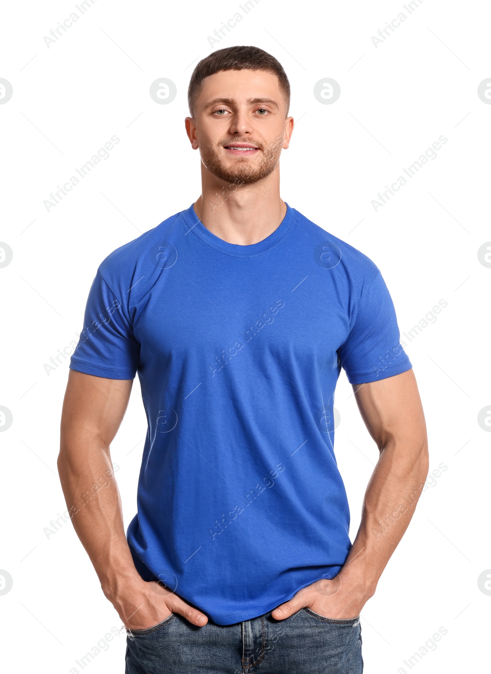 Photo of Man wearing blue t-shirt on white background. Mockup for design