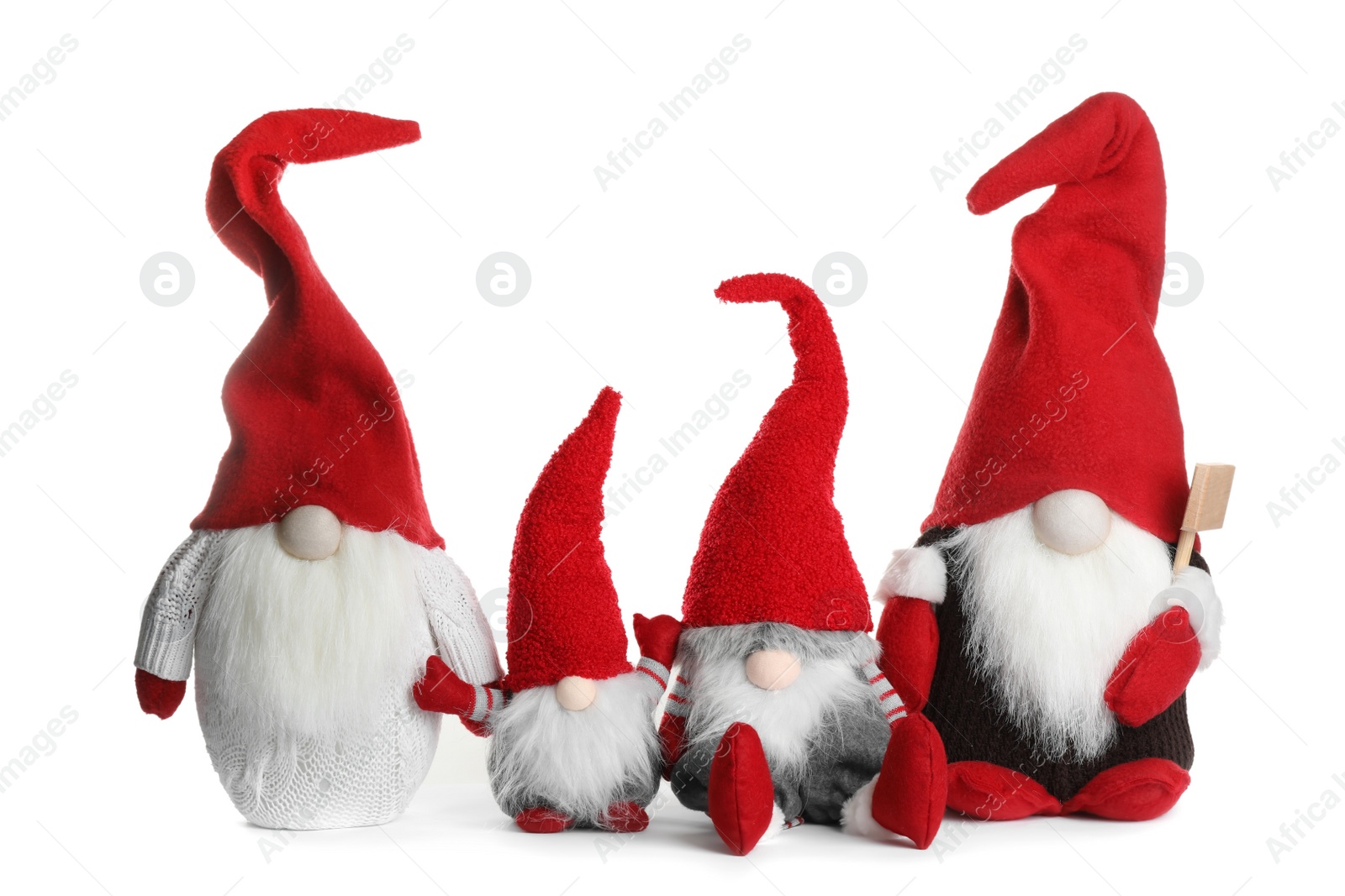 Photo of Cute Christmas gnomes on white background. Festive decor