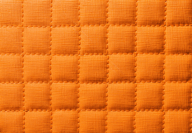 Image of Texture of orange leather as background, closeup