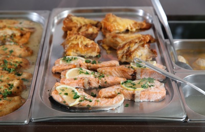 Containers with healthy food in school canteen