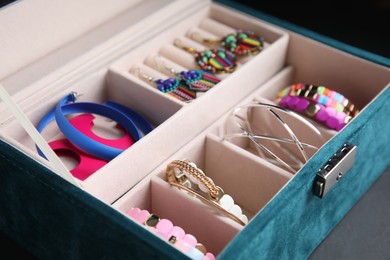 Photo of Elegant jewelry box with beautiful bijouterie, closeup