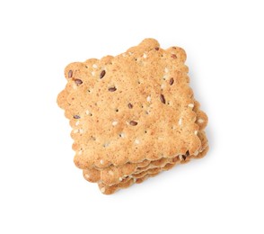 Photo of Stack of cereal crackers with flax and sesame seeds isolated on white, top view