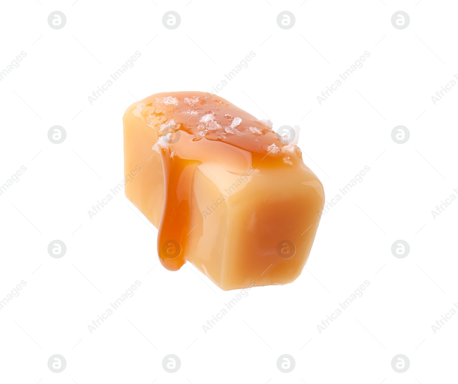 Photo of Yummy candy with salted caramel isolated on white