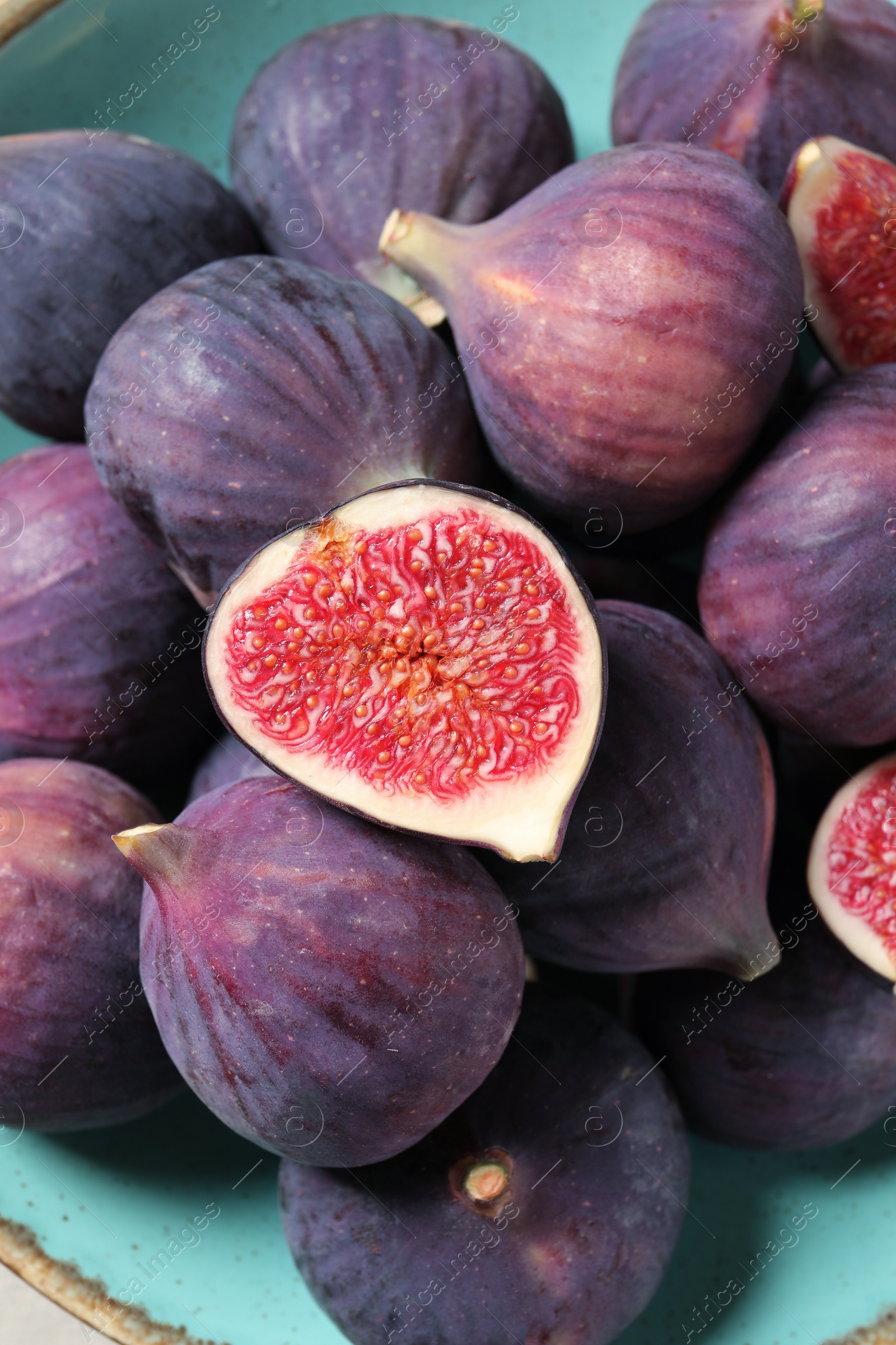 Photo of Plate with fresh ripe figs, above view