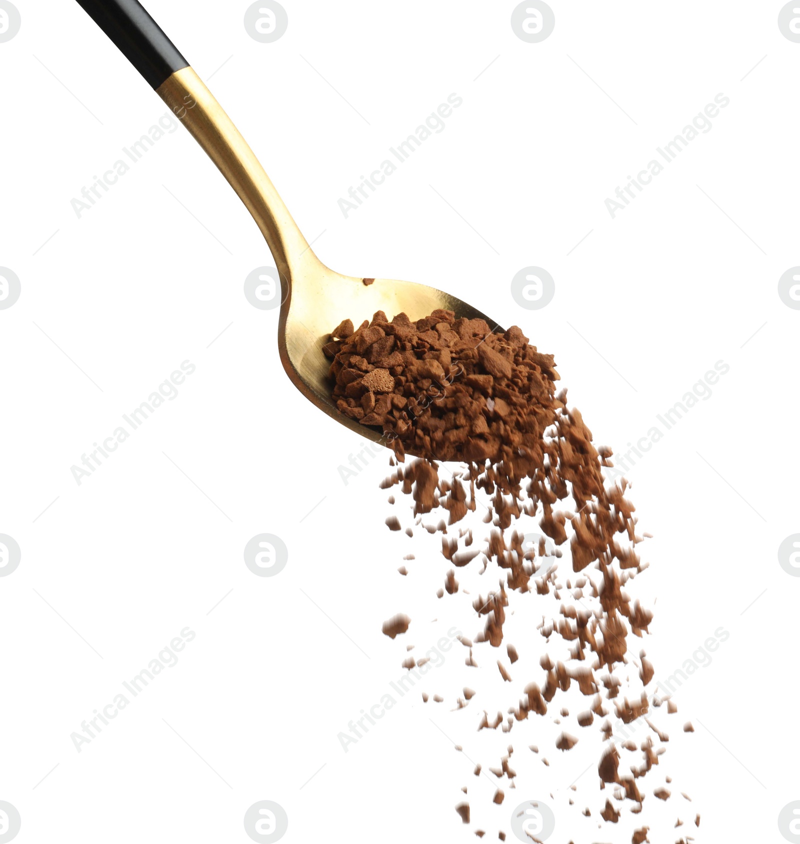 Photo of Pouring aromatic instant coffee from spoon on white background