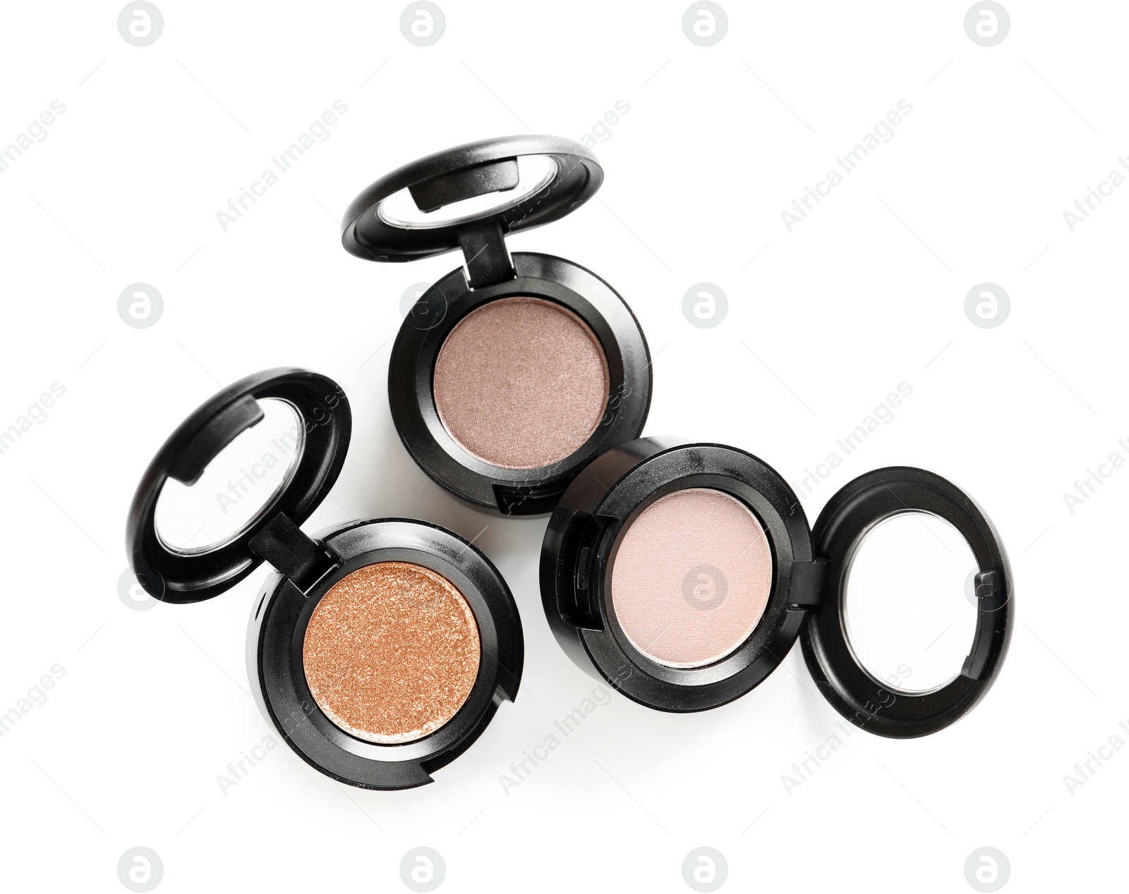 Photo of Different eye shadows on white background, top view. Decorative cosmetics