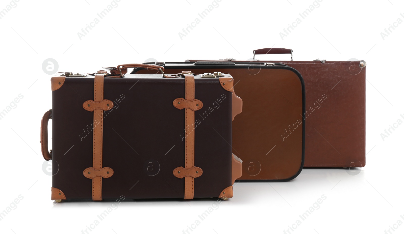 Photo of Set of classic suitcases on white background