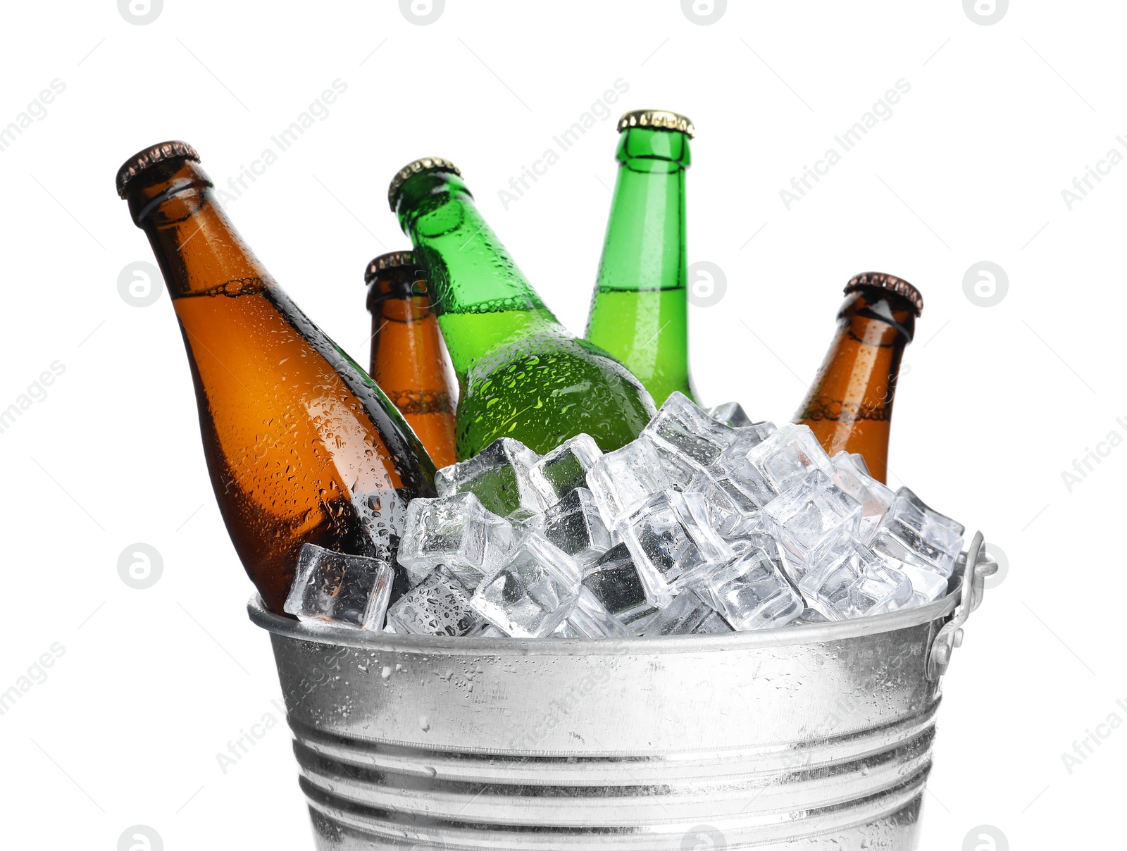 Photo of Metal bucket with bottles of beer and ice cubes isolated on white