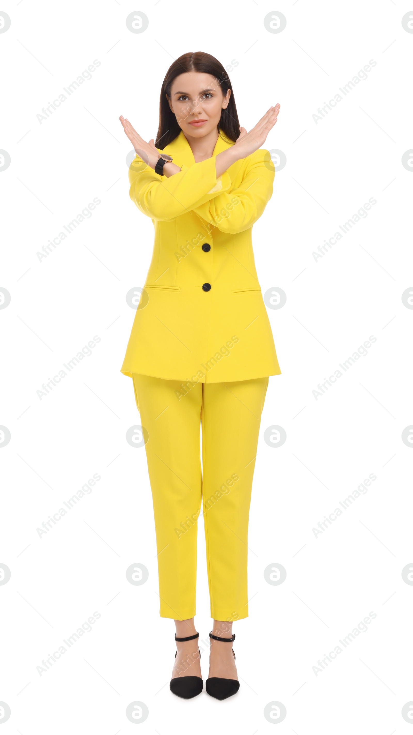 Photo of Beautiful businesswoman in yellow suit on white background