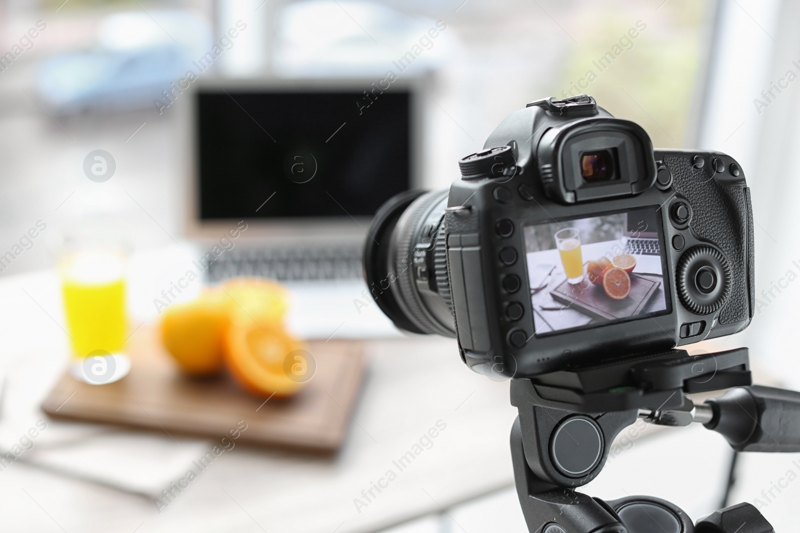 Photo of Picture of food for blog on camera screen indoors. Space for text