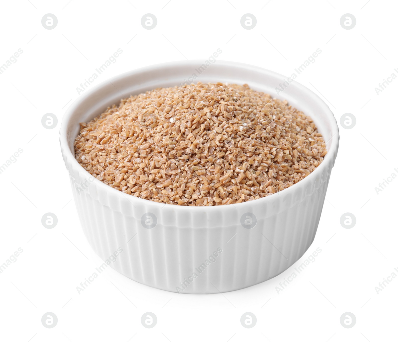 Photo of Dry wheat groats in bowl isolated on white