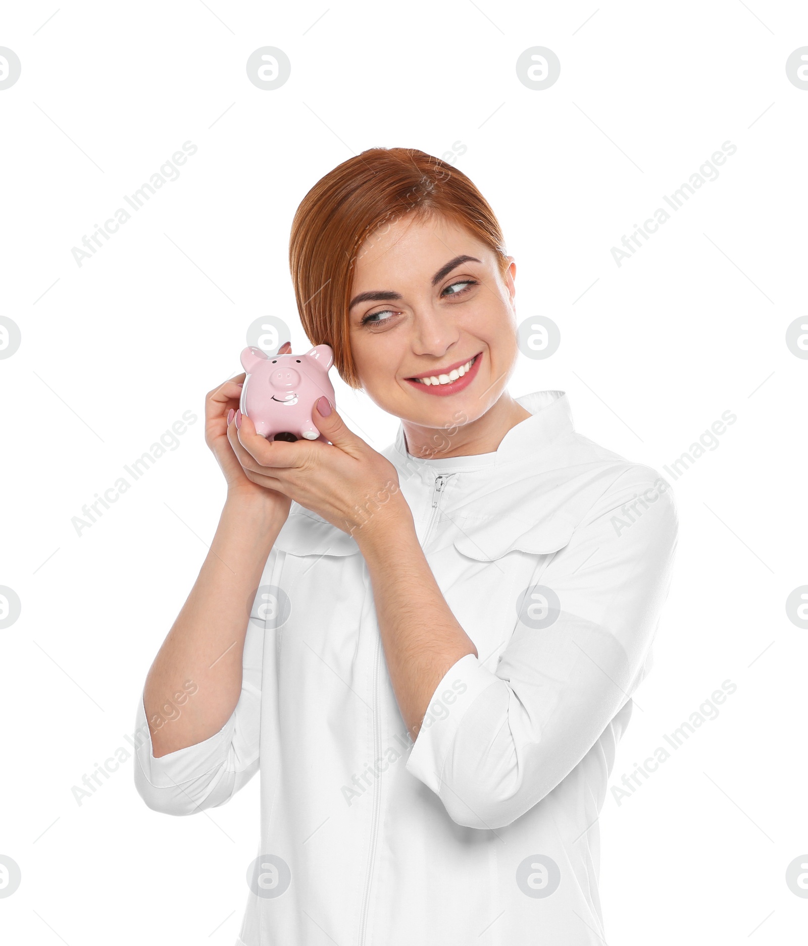 Photo of Portrait of female doctor with piggy bank on white background