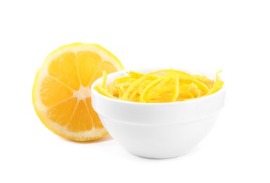 Photo of Grated lemon zest and fresh fruit on white background