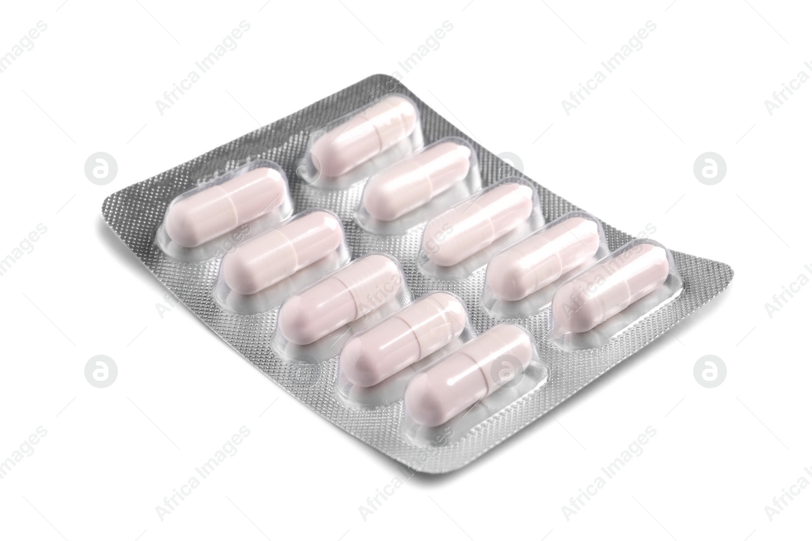 Photo of Blister of pills on white background. Medicinal treatment