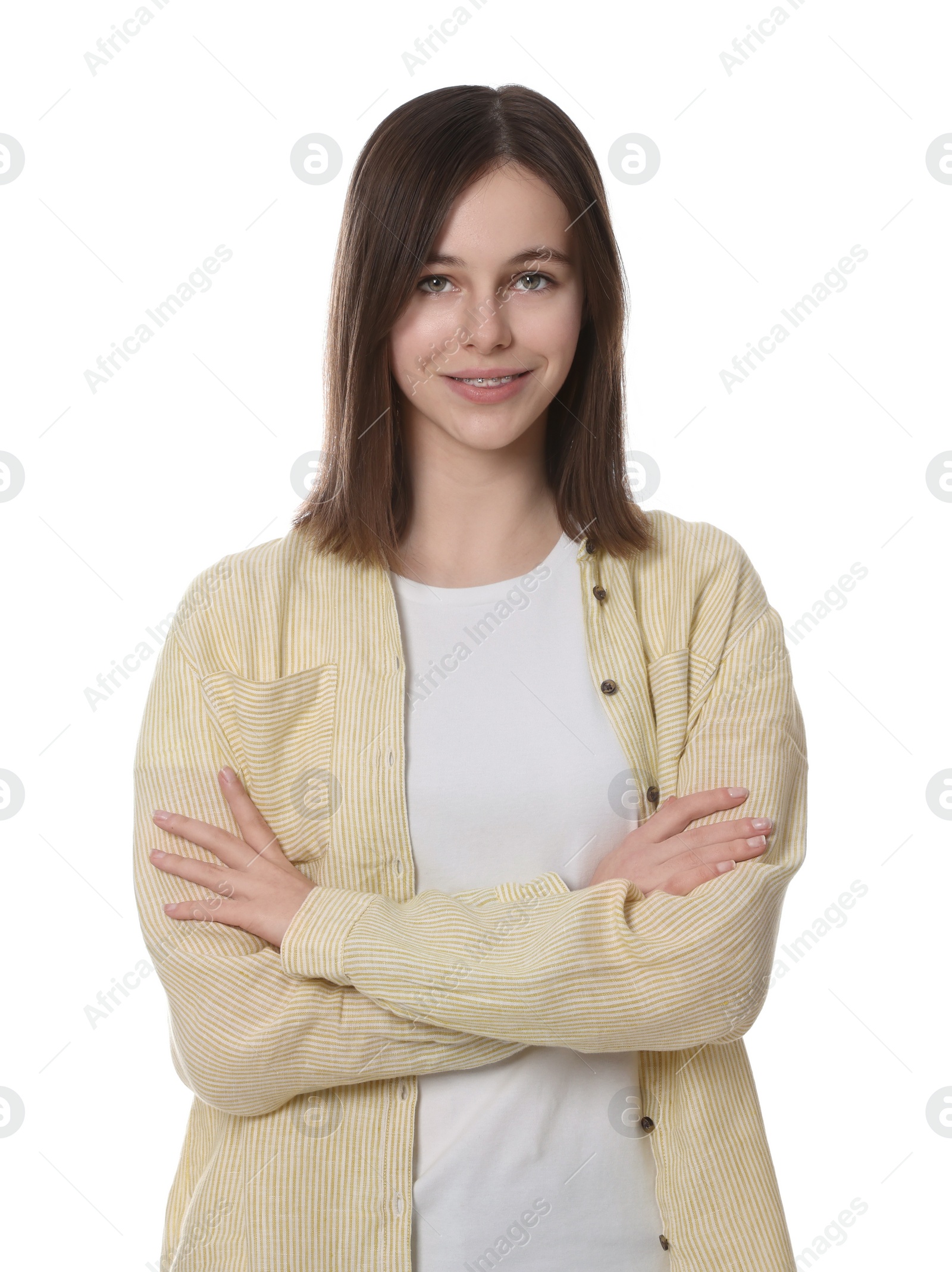 Photo of Portrait of smiling teenage girl on white background