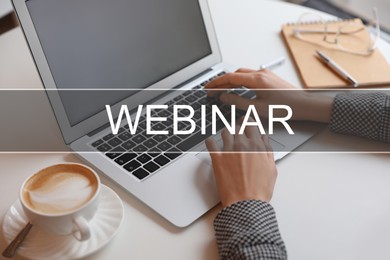 Image of Webinar concept. Woman working with laptop at table indoors, closeup