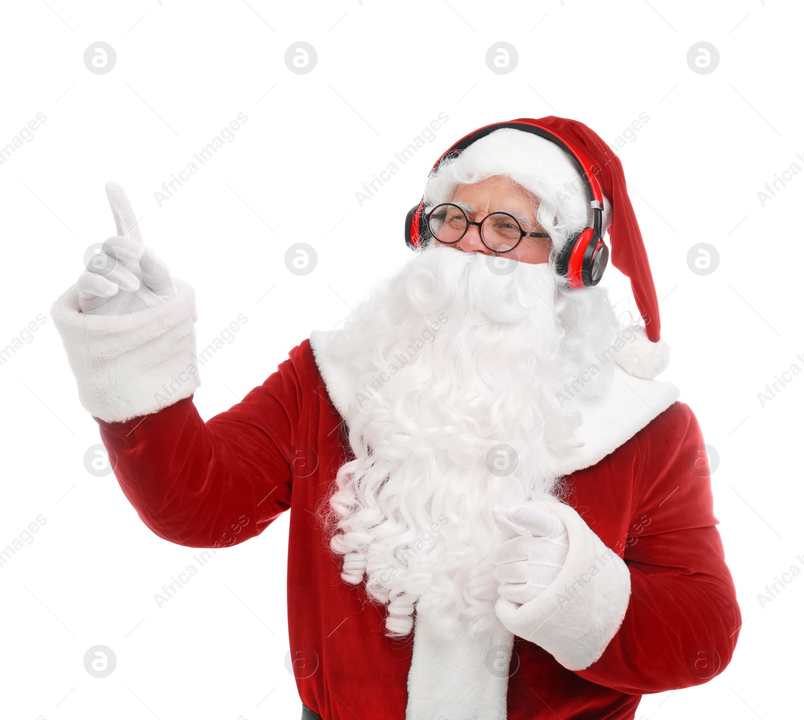 Photo of Santa Claus listening to Christmas music on white background