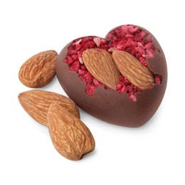 Photo of Tasty chocolate heart shaped candy with nuts on white background