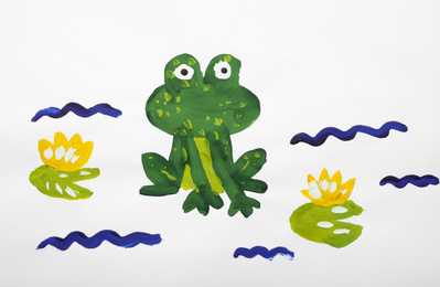 Child's painting of frog on white paper